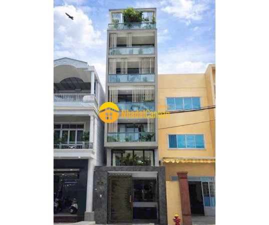 Bán tòa nhà 650m² sàn vị trí vàng khu sân bay hầm 6 tầng thang máy giá 33 tỷ tl